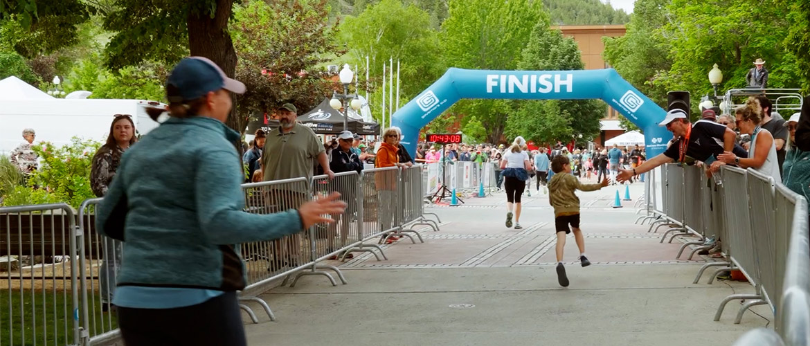 Runners reaching the finish line of a race