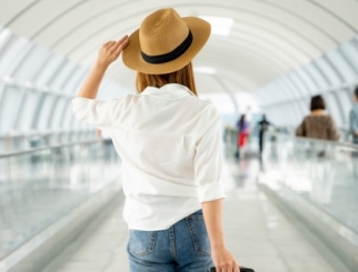 Woman wearing a hat in the airport