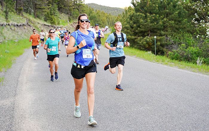 Competitors jog on roadway in Montana Governor’s Cup.