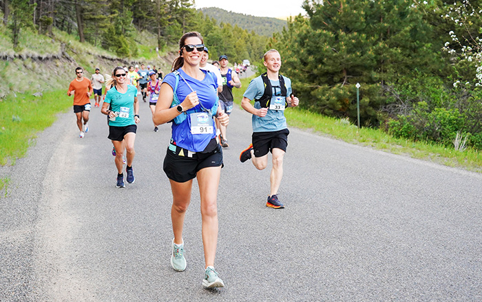 Competitors jog on roadway in Montana Governor’s Cup.