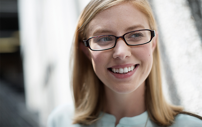 Woman smiling looking to side